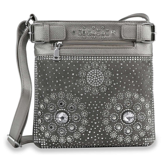 The Stud And Rhinestone Design Crossbody Sling is a gray faux leather bag with an adjustable strap, zippered pocket, and front decorated with silver studs and circular rhinestones—offering chic style and everyday convenience.