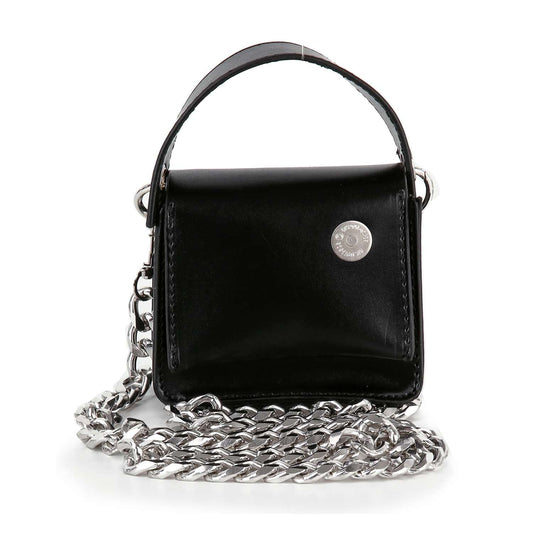 The Chain Accented Evening Bag is a small black faux leather micro evening bag featuring a top handle, front flap with silver button, and detachable long silver chain strap.