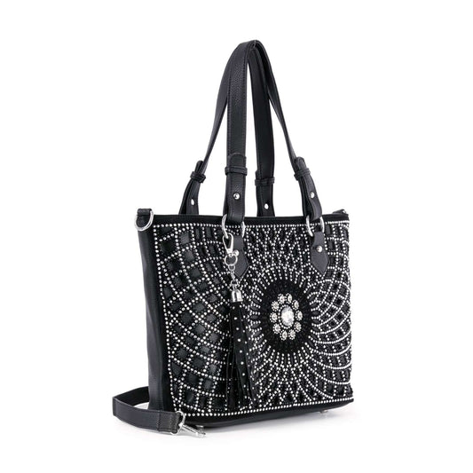The Patterned Bling Layered Design Shopper Tote is a black faux leather handbag with double handles, silver studs, a rhinestone sunburst pattern, detachable shoulder strap, decorative tassel, silver hardware, and fits a tablet.