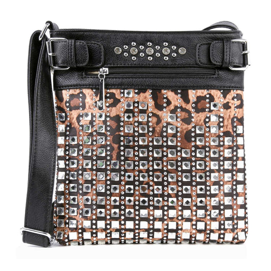The Leopard Print Sparkling Stone Crossbody Sling features a black strap, silver studs, rhinestones, square metallic accents on the front, a zippered pocket, and decorative buckles at the top.