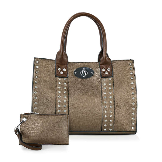 The Accessorized Twist-Lock Handbag is a brown faux leather tote with studded vertical stripes, dual handles, a front twist-lock clasp, and comes with a matching zippered pouch with a wrist strap.