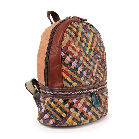 The Genuine Leather Woven Backpack features a stylish multicolored woven pattern on the front and bottom, brown leather accents, visible straps and top handle, plus a secure zipper closure.