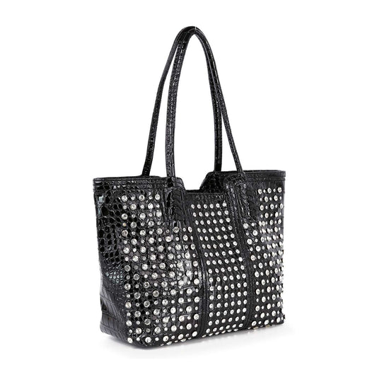 The Studded Embossed Tote Handbag features black alligator-embossed faux leather, two shoulder straps, and striking silver studs on the front and sides—perfect for making a statement on any occasion.