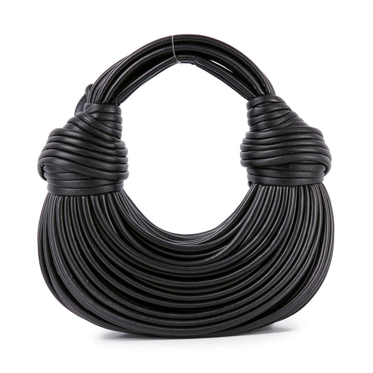 The Unique Hobo Handbag is a black faux leather bag with sculptural, rounded tubular layers around the body and handle. It features a bold, textured design and includes a detachable strap for versatile styling.