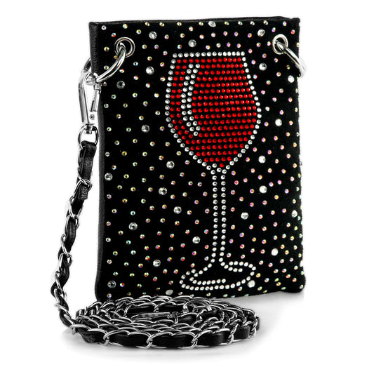 The Red Wine Glass Petite Crossbody Sling is a small faux leather bag adorned with rhinestones in a red wine glass design and features a metal chain strap attached by large metal rings.