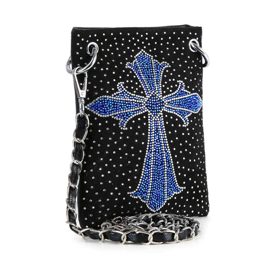 The Rhinestone Cross Ultra Petite Crossbody Sling is a black faux leather bag with silver studs, a bold blue rhinestone cross on the front, and a sleek silver chain strap—perfect for adding striking style to any occasion.