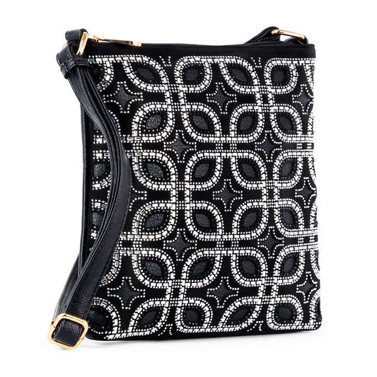 The Art Deco Design Crossbody Sling is a chic black bag with a geometric pattern of white and silver beads, faux leather detail, gold hardware, and a long black adjustable strap.
