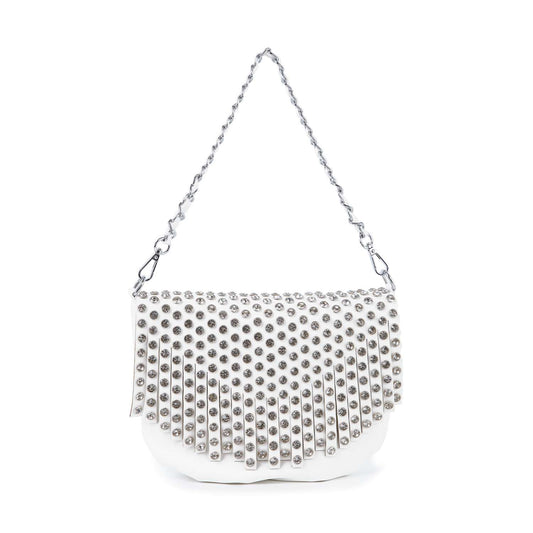 The Studded Fringe Shoulder Bag features white faux leather, a flap adorned with rows of silver studs, and a silver chain strap. Shown against a plain white background.