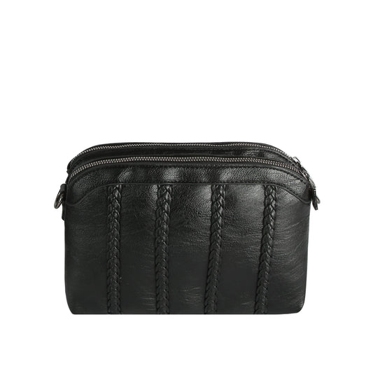 The Braid Accented Dual Opening Crossbody is a black faux leather bag with three vertical braids and gunmetal hardware on the front, featuring dual top zip closures, shown on a plain white background.