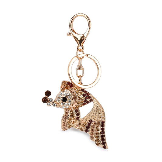 The Colorful Rhinestone Fish Purse Charm is a gold keychain and bag accessory featuring a fish decorated with sparkling brown, gold, and clear rhinestones, finished with a clasp and keyring at the top.
