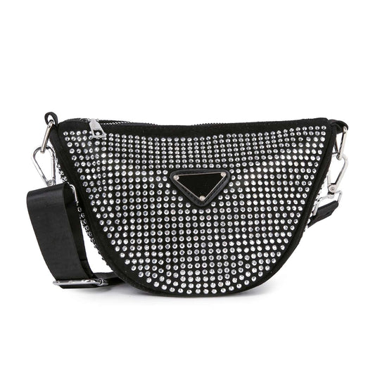 The Sparkling Rhinestone Crossbody Sling is a black faux leather bag with a wide adjustable strap, rows of rhinestones, and a triangular logo plate on the front.
