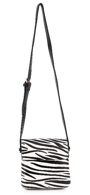 The Classic Front Flap Cell Phone Crossbody Bag features a petite white body with bold black zebra stripes, a long black adjustable strap, and gold-toned hardware.