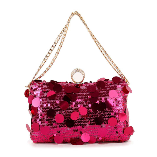 The Sequin Design Evening Bag is a chic rectangular pink accessory with large shiny sequins, a gold chain strap, and a circular rhinestone clasp—perfect for adding elegance to your evening look.