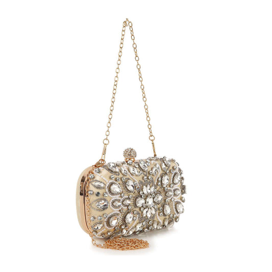 The Highly Decorative Retro Evening Bag features a gold clutch design with large, intricate clear gemstones, a vintage pattern, gold chain handle, and decorative clasp—perfect for special occasions.