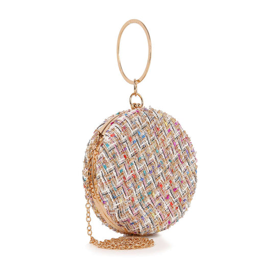 The Tweed Ball Design Evening Bag is a round clutch purse featuring a multicolored woven pattern, gold trim, top clasp closure, chain strap, and a large gold ring handle, displayed against a white background.