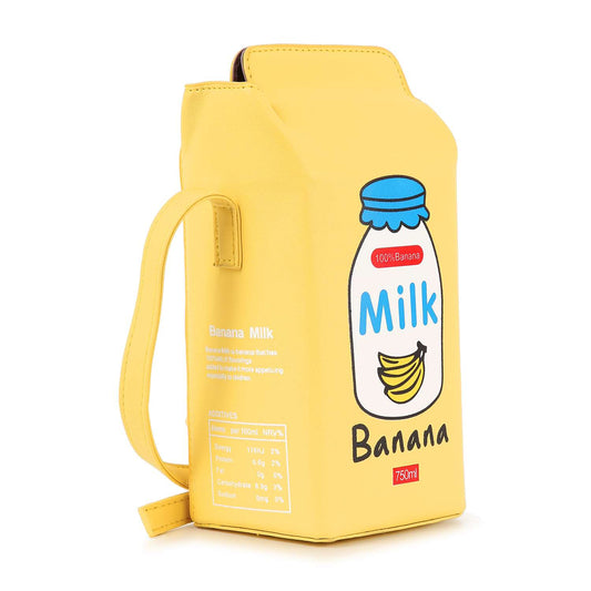 The Cute Carton Style Shoulder Bag is a yellow faux leather handbag shaped like banana milk, featuring a cartoon bottle with bananas, a side single strap handle, Milk Banana label, and printed nutrition facts on the front.