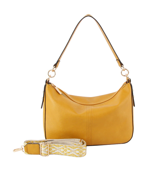 The Mini Shoulder Bag With Guitar Strap features mustard yellow faux leather, a single top handle, gold hardware, and comes with an adjustable yellow and white guitar strap for versatile styling.