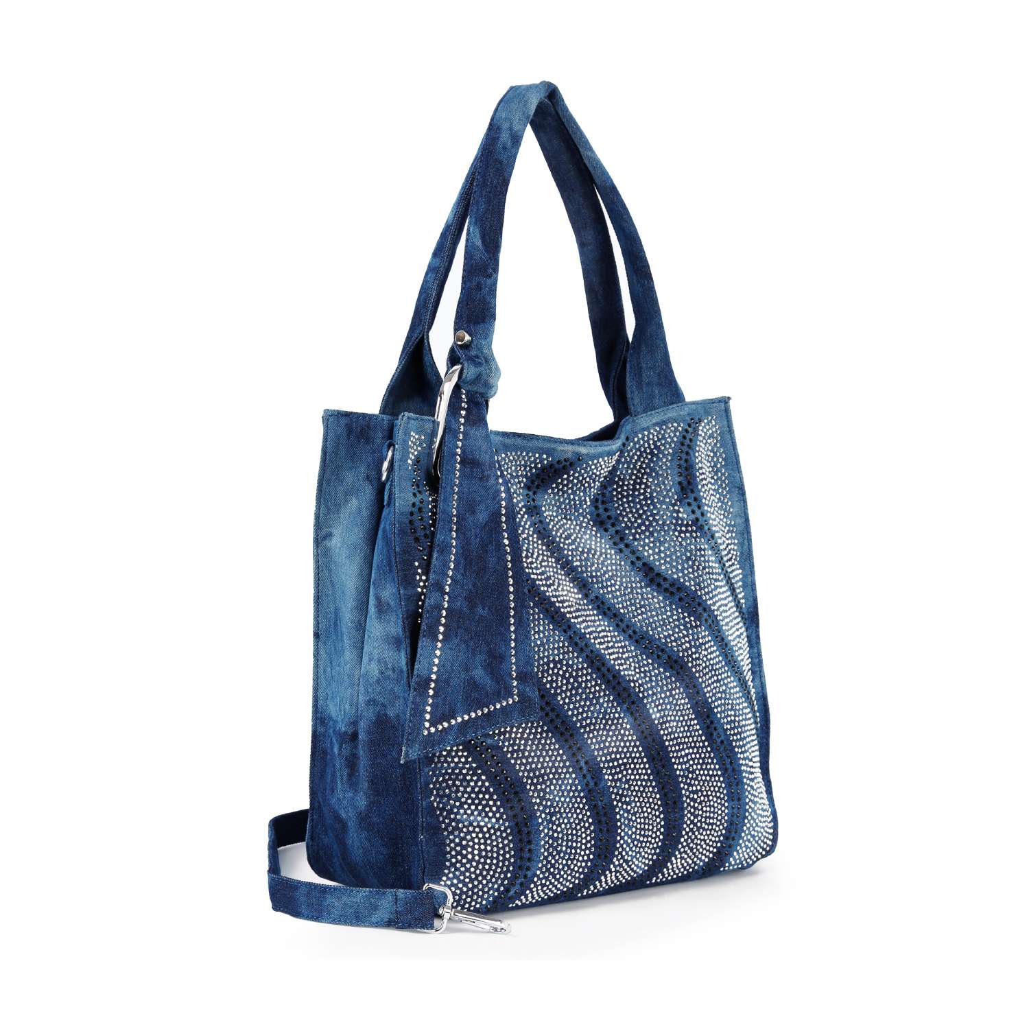 The Rhinestone Pattern Tote is a blue suede bag with a matching strap and handle, featuring silver rhinestone wave designs on the front. It fits a tablet and has a rectangular suede tag for extra style.