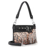 The Belted Rhinestone Shoulder Bag is a stylish faux leather handbag with a black handle, detachable strap, silver hardware, buckle detail, and silver studs on a patterned peach and black front panel.
