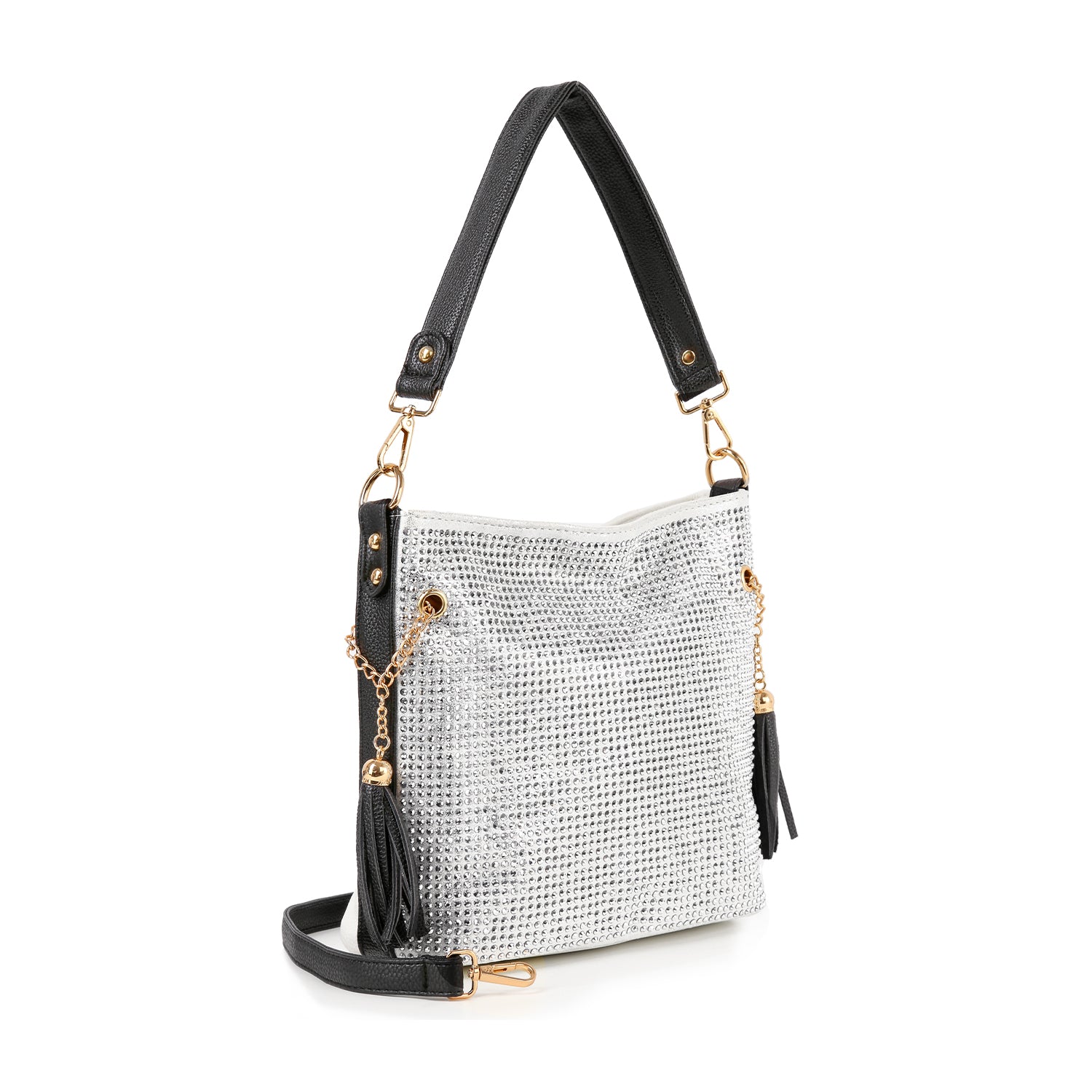 The Sparkling Rhinestone Hobo Handbag features a shimmering silver exterior, black faux leather handles, tassel accents, gold hardware, and a detachable shoulder strap. This stylish bag stands upright against a white background.