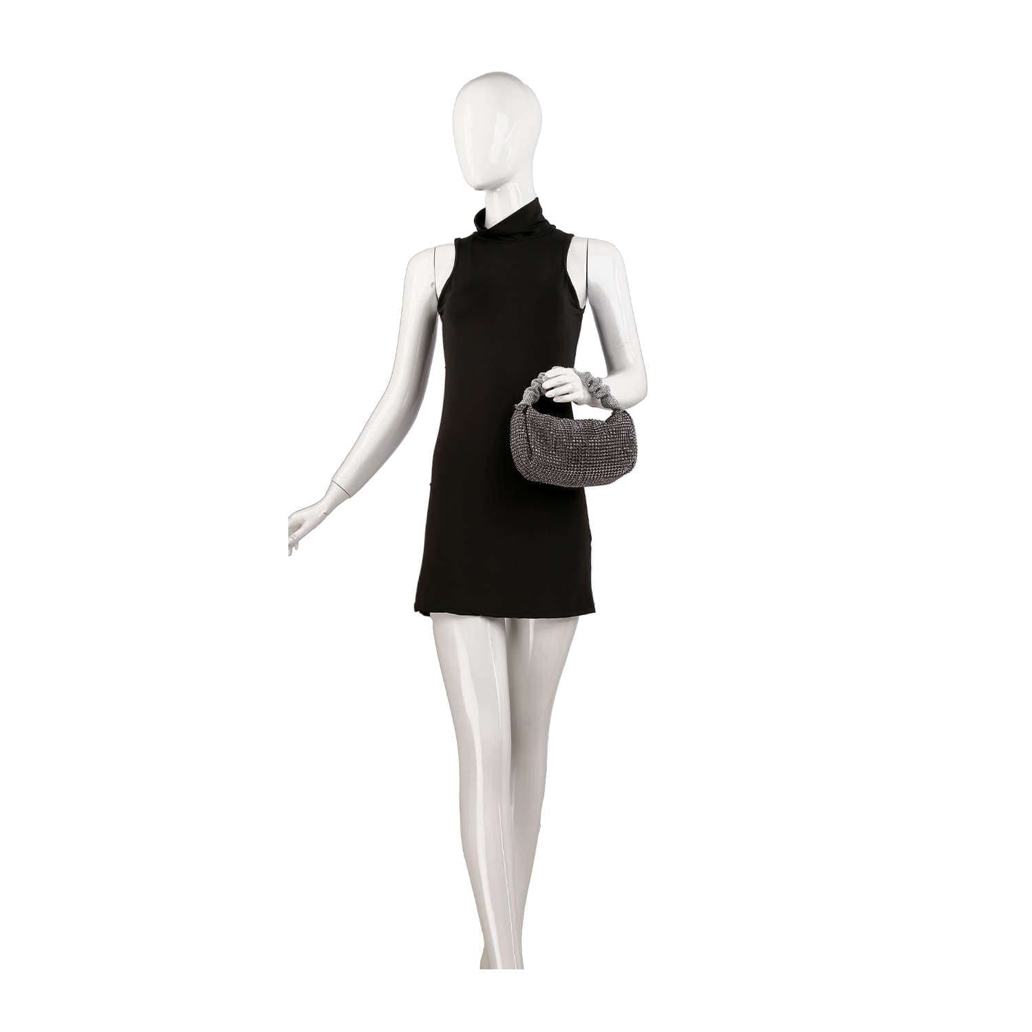 A mannequin in a sleeveless black mini dress holds the Ruched Sparkling Stone Fashion Bag—a petite, textured gray faux leather handbag—in its left hand, posed against a plain white background.