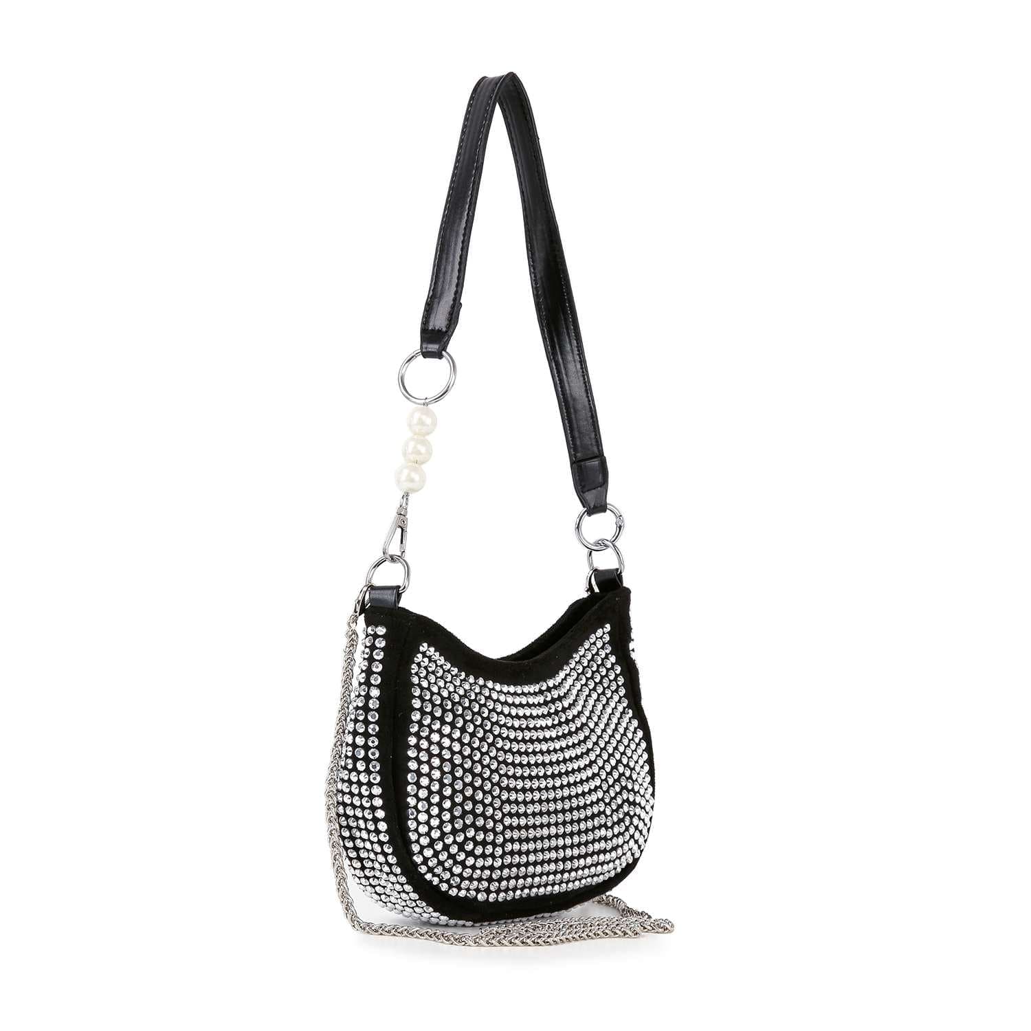 The Rhinestone Accented Petite Shoulder Bag is a small black faux leather bag with silver rhinestones, a black strap featuring a pearl accent, and a detachable chain strap.