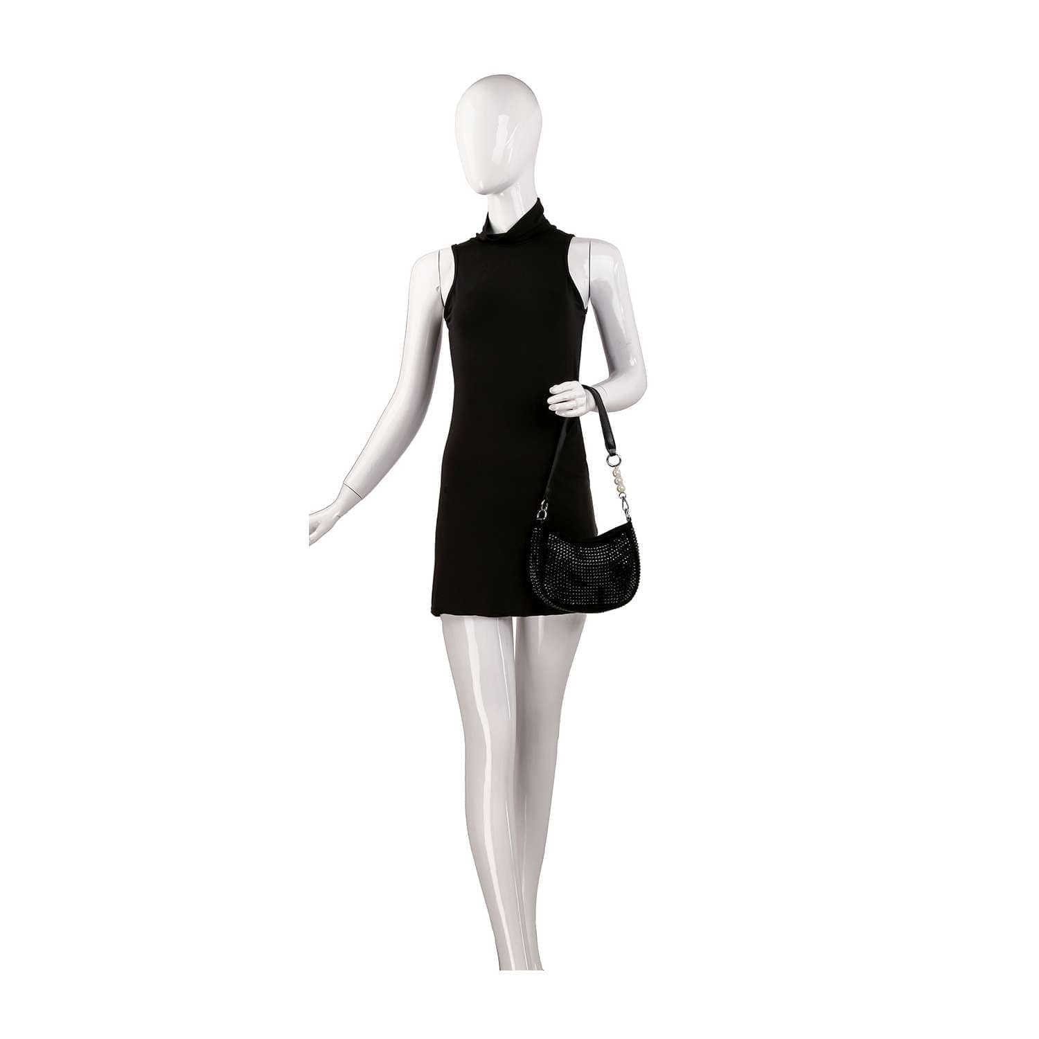 A mannequin in a black sleeveless mini dress holds the Rhinestone Accented Petite Shoulder Bag with a detachable chain strap, posing against a plain white background.