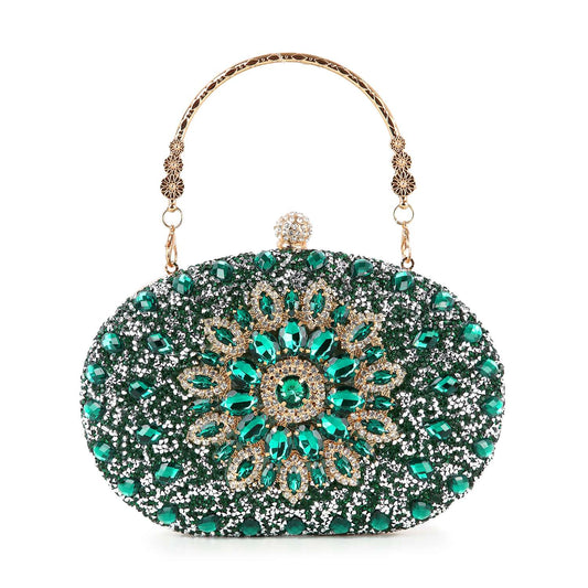 The Highly Decorative Retro Evening Bag is an oval-shaped evening purse adorned with green and clear gemstones in a floral retro design, featuring a jeweled clasp and a gold chain handle.