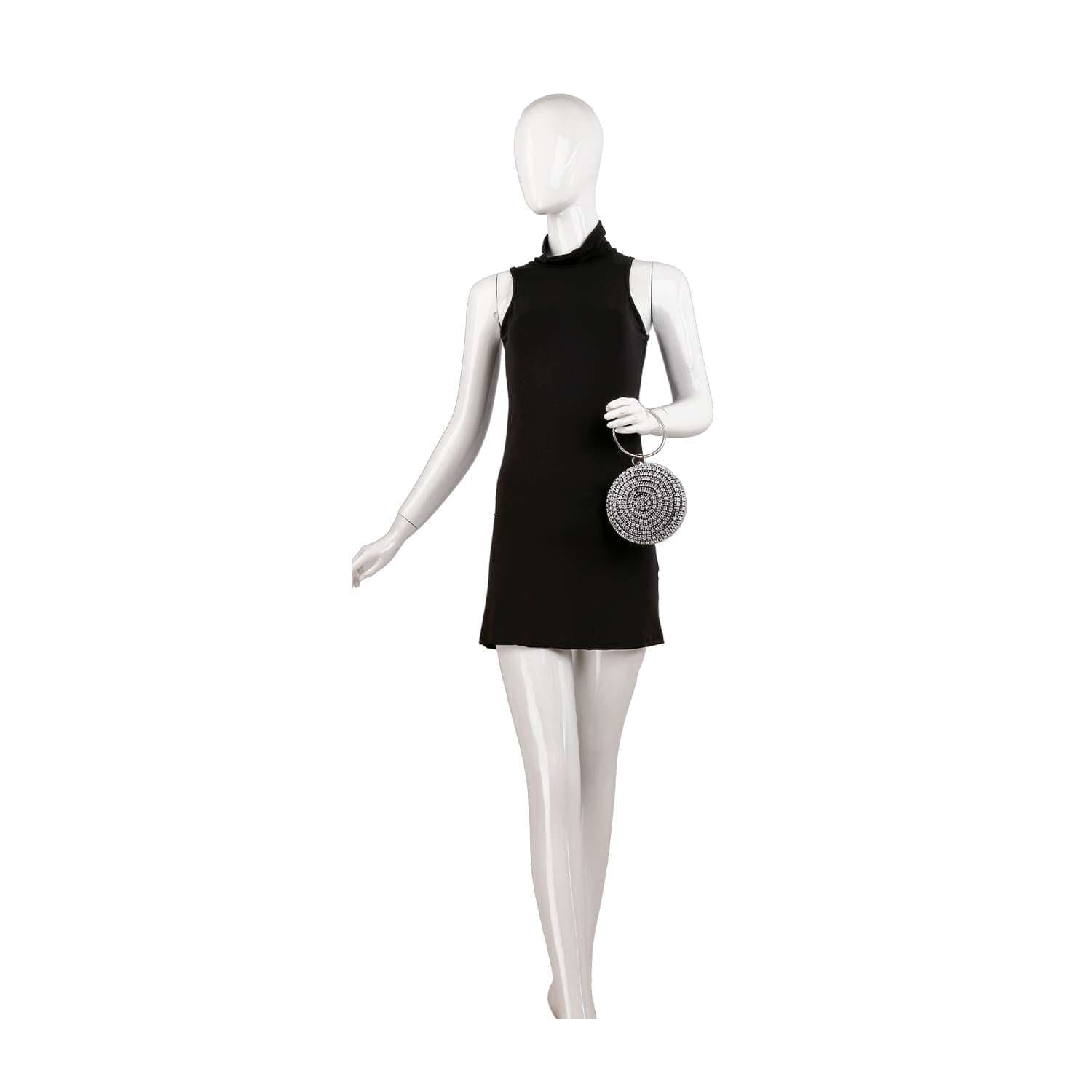 A mannequin in a sleeveless black mini dress holds the Circular Rhinestone Evening Bag in its left hand, posed against a plain white background.