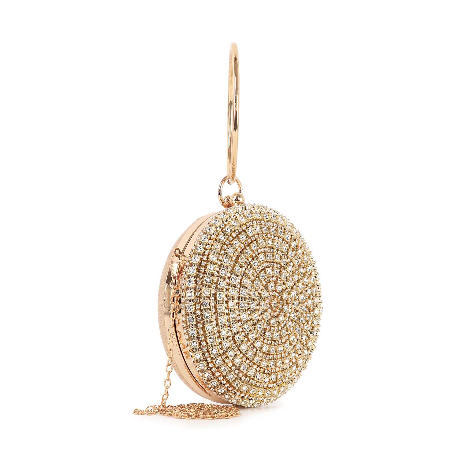 The Circular Rhinestone Evening Bag is a gold, round bag adorned with sparkling rhinestones in a circular pattern, featuring a slim gold wrist handle and a delicate side-attached gold chain.
