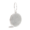 The Circular Rhinestone Evening Bag features dazzling rhinestones, a sleek metal ring handle, and a heart-shaped charm—making it the perfect glamorous wristlet for special nights out.
