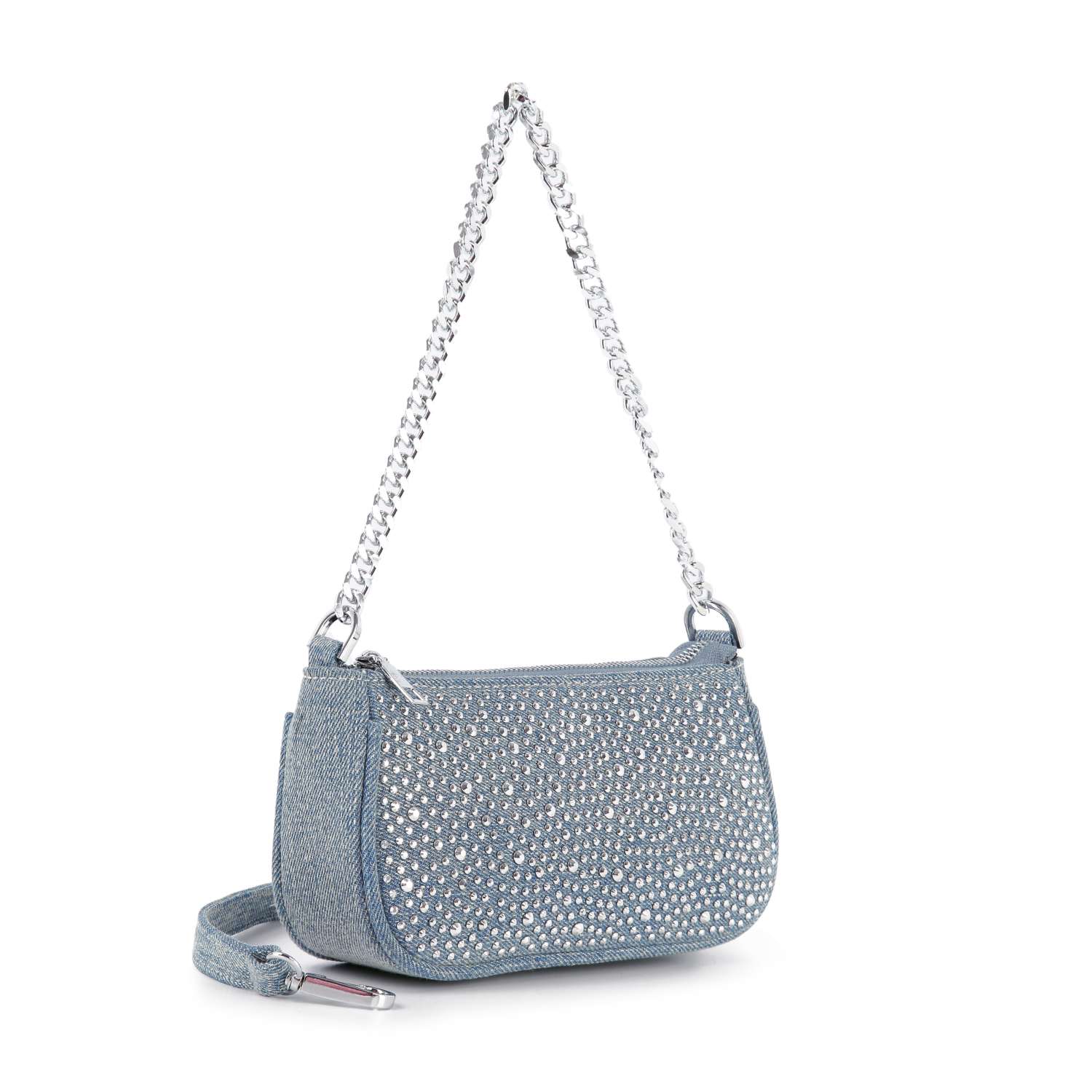 The Denim Bling Shoulder Bag features a curved denim design, sparkling rhinestones on the front, a silver chain strap, and comes with an extra matching denim strap—perfect for everyday style.