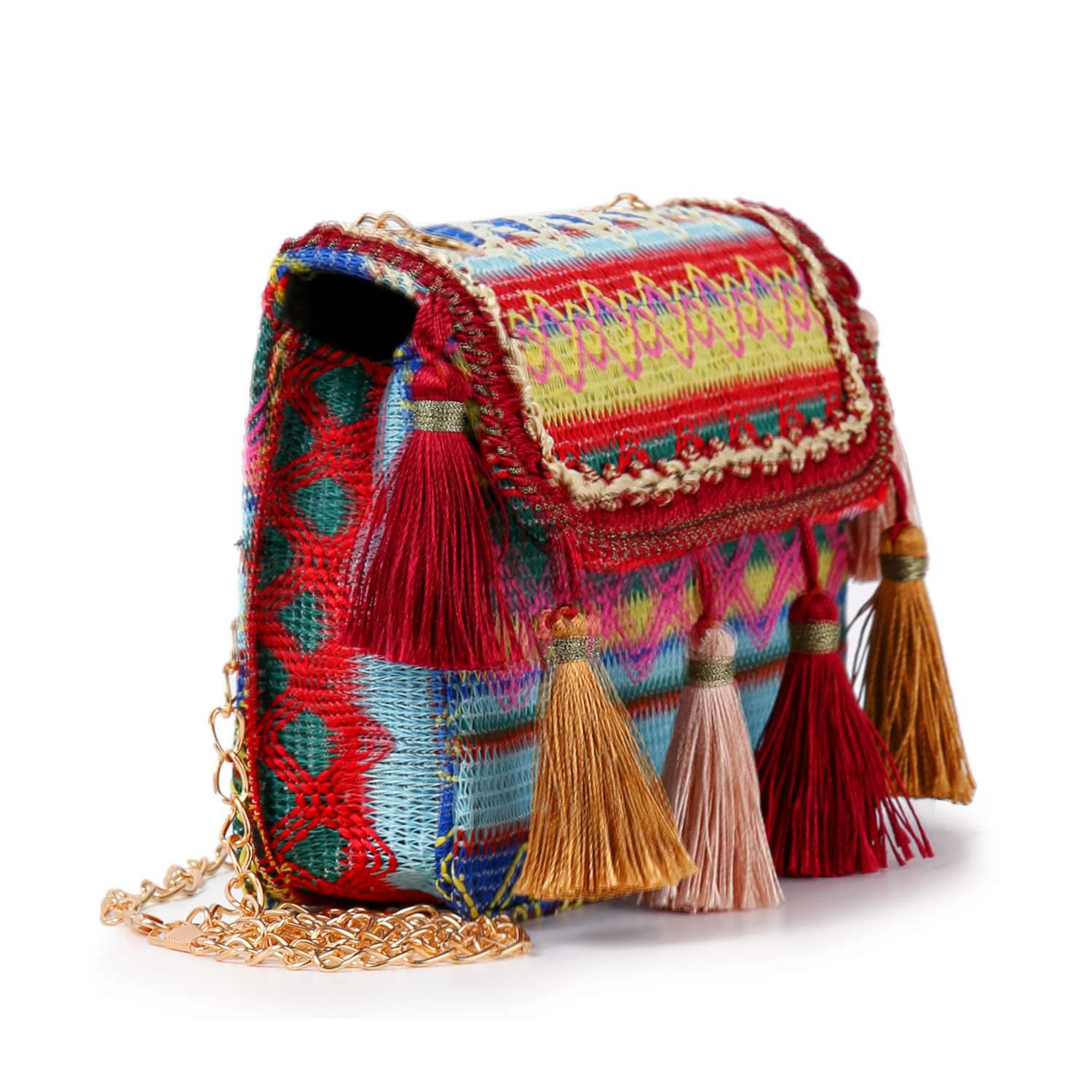 The Tassel Accented Woven Design Shoulder Bag features tasseled accents, a gold chain strap, and geometric woven patterns in blue, red, yellow, and green with red, tan, and beige tassels.
