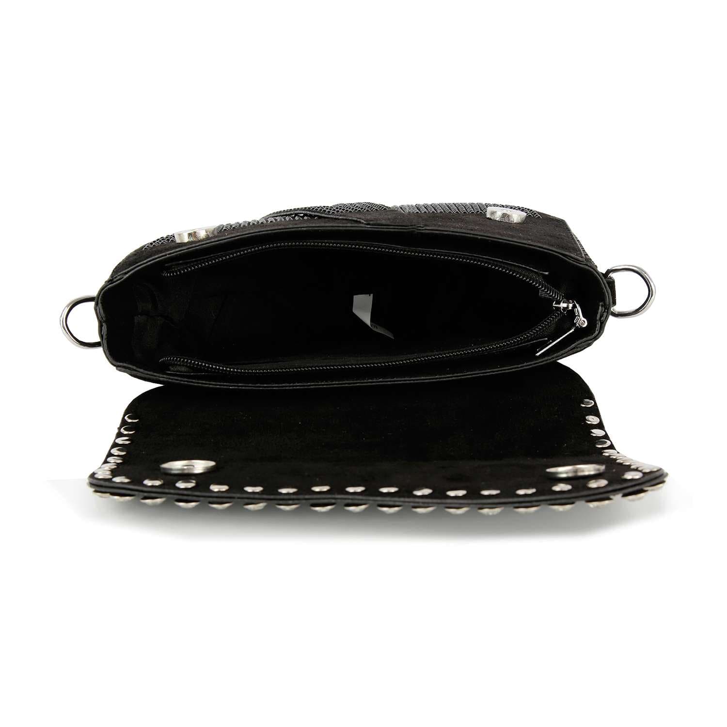 The Chain Handle Petite Shoulder Bag features black studded faux leather, a flap with silver studs, metal rings on the sides, a chain strap, and an interior with a zippered pocket and main compartment.