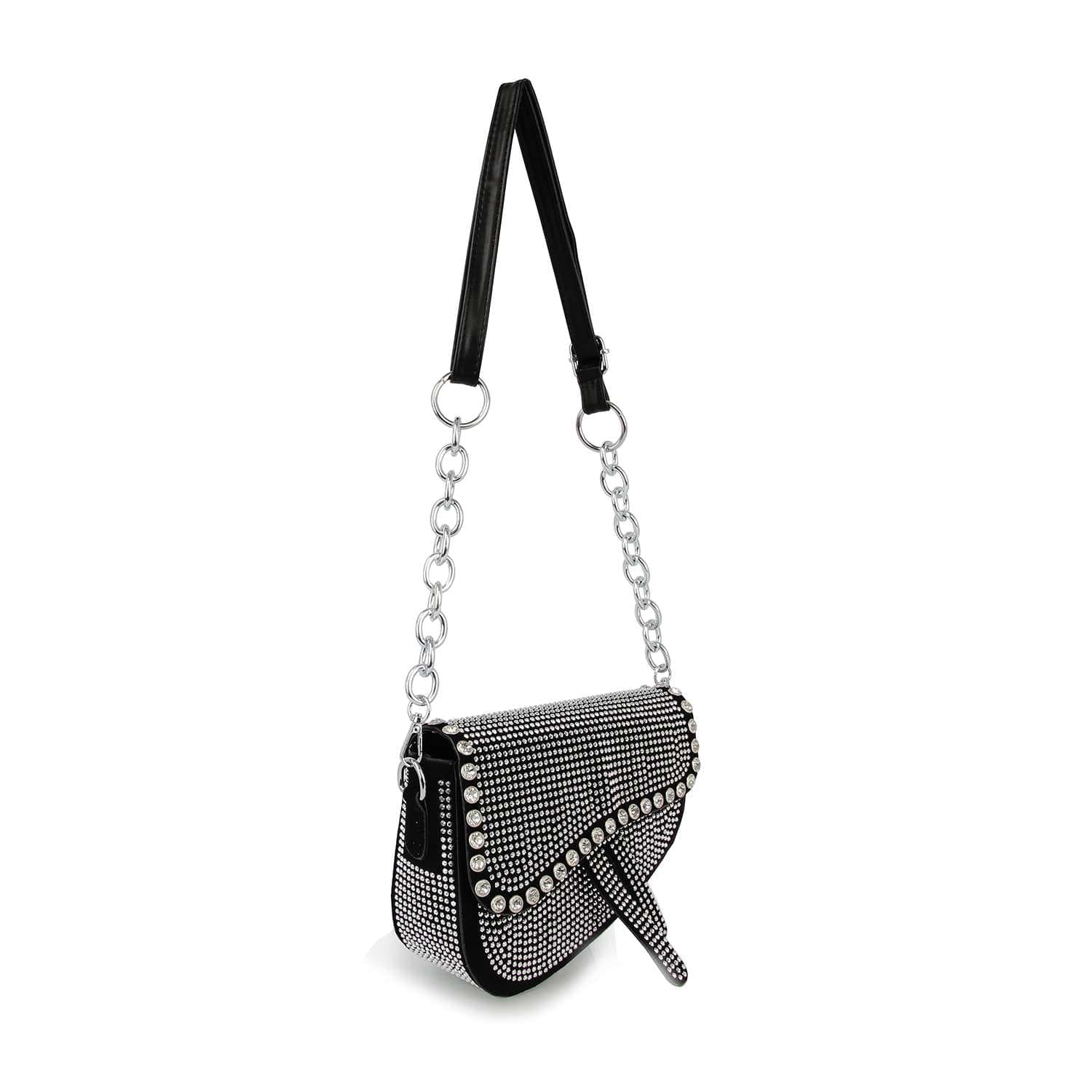 The Chain Handle Petite Shoulder Bag is a black hobo bag covered in small silver rhinestones, with large decorative studs on the flap, and a chic chain strap intertwined with black material.