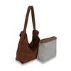 The Genuine Leather Two-In-One Hobo Handbag Set features a brown suede shoulder bag with wide straps, paired with a matching rectangular zippered pouch in gray and white mesh with brown trim.