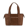 The Genuine Leather Classic Fashion Carry All is a medium brown leather tote with two handles, a front zipper pocket, structured design, smooth finish, and subtle stitching—ideal for the office or travel.