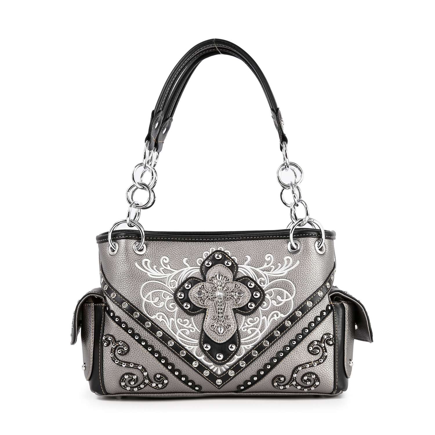 The Western Rhinestone Cross Handbag is a silver and black faux leather purse with ornate embroidery, a large rhinestone cross centerpiece, curved patterns, side pockets, double handles with silver rings, and rhinestone stud accents.