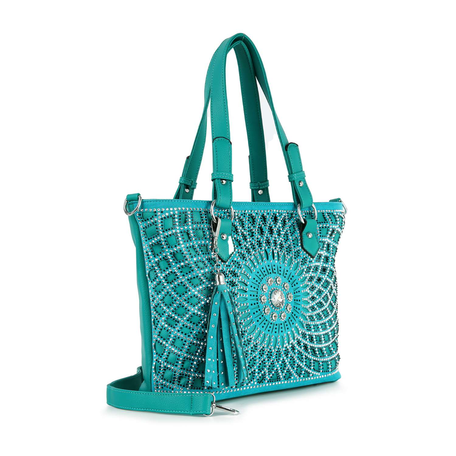 The Patterned Bling Layered Design Shopper Tote features turquoise faux leather, double handles, a detachable strap, decorative silver studs, circular patterns, and a front tassel accent.
