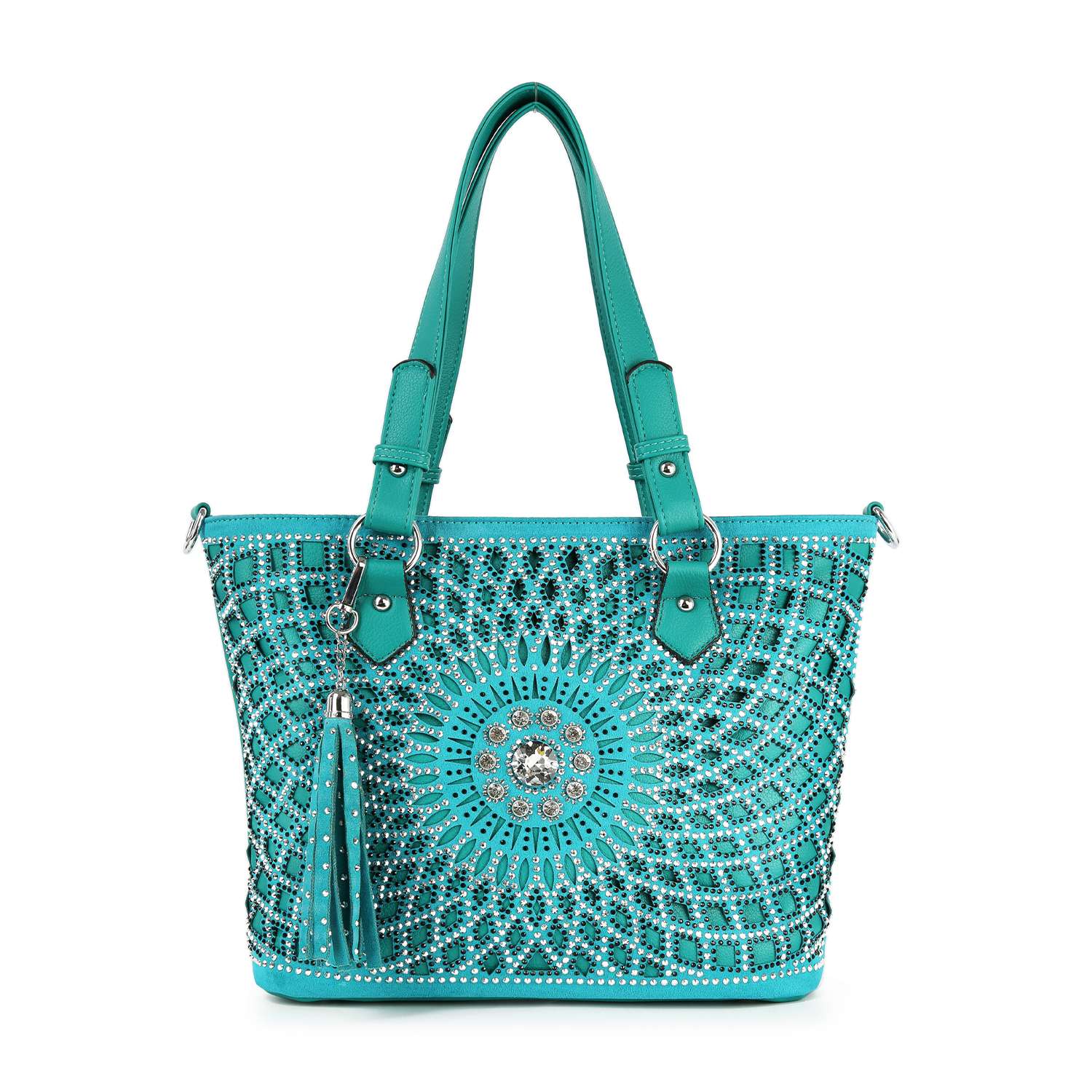The Patterned Bling Layered Design Shopper Tote is a turquoise faux leather tote with dual handles, featuring silver and black rhinestone sunburst patterns in a circular design and a matching tassel accent.