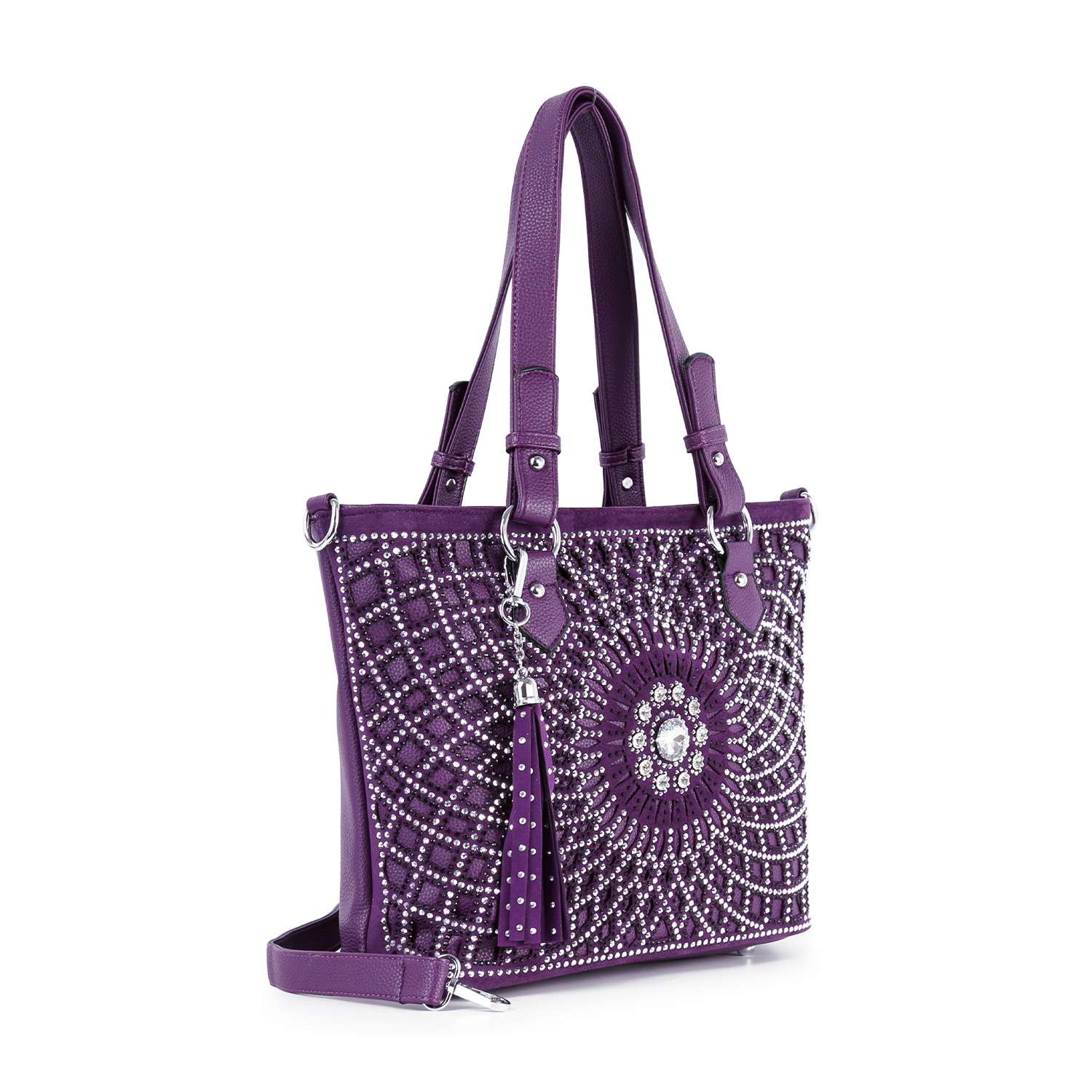 The Patterned Bling Layered Design Shopper Tote is a purple sunburst handbag with silver studs and rhinestones, a decorative tassel and charm, an adjustable strap, and spacious enough to fit a tablet.
