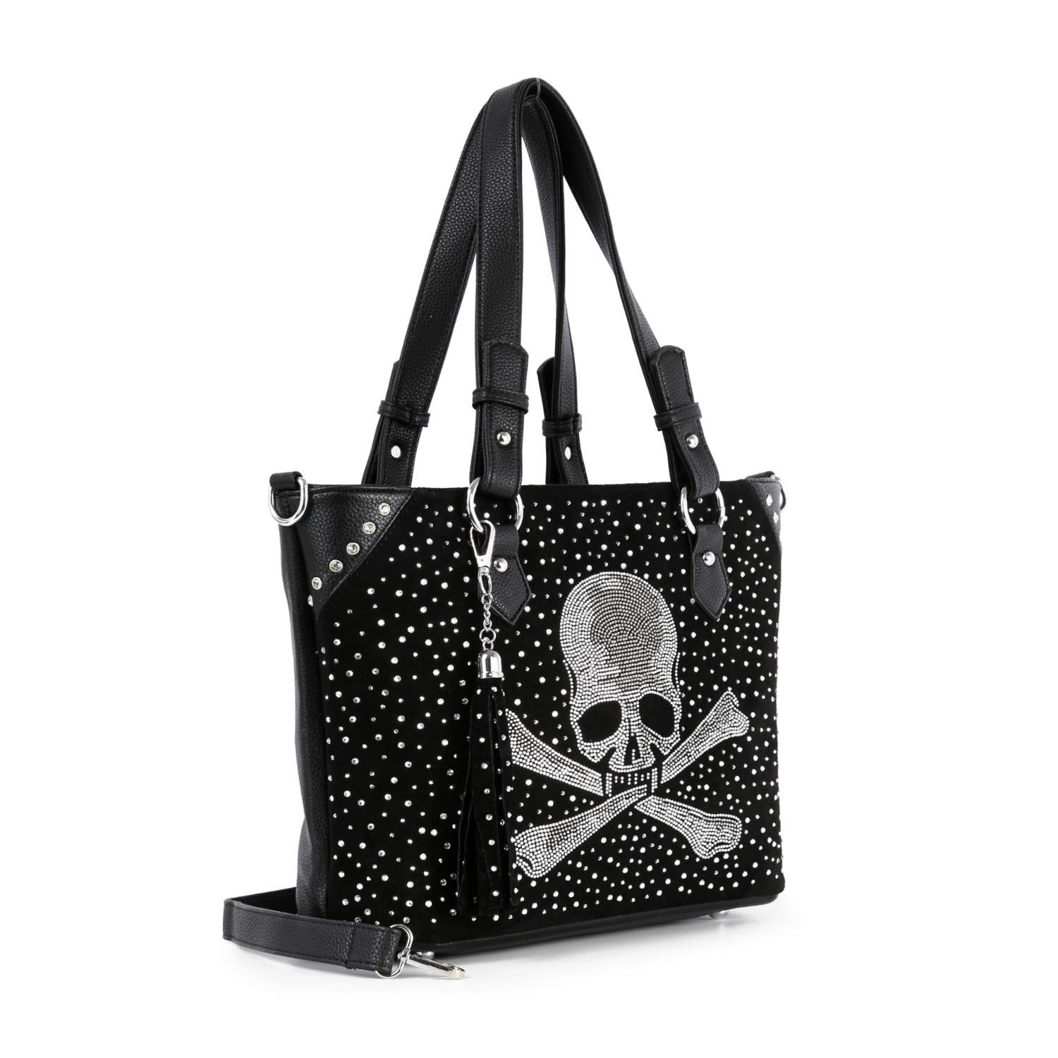 The Rhinestone Skull Shopper Tote is a black faux leather bag with double handles, silver studs, a large white skull front design, detachable shoulder strap, decorative tassel, and fits most tablets.
