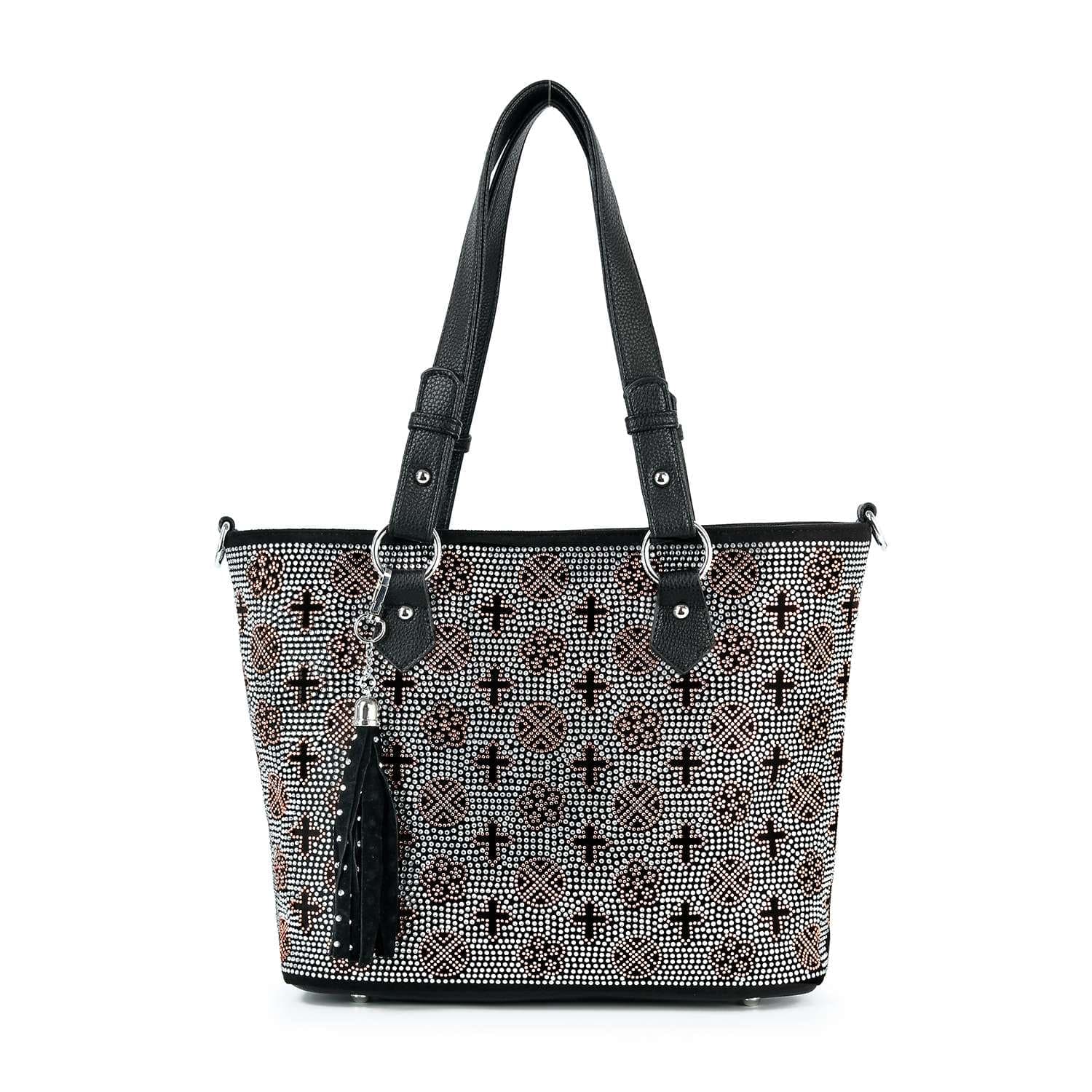 The Rhinestone Signature Print Classic Tote Bag features a black and white geometric signature print, two black shoulder straps, and a decorative black tassel hanging from one handle.