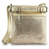 The Diamond Bling Crossbody Sling features a faux leather gold finish with diamond cutouts, metallic studs, a front zipper pocket, decorative top buckles, and an adjustable strap for stylish versatility.