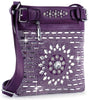 The Brilliant Rhinestone Crossbody Sling is a purple faux leather bag with silver rhinestones in geometric patterns, a central circular sparkling accent, adjustable strap, and zippered top closure.