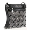 The Stunning Patterned Designed Crossbody Sling features a wide adjustable strap, front zipper pocket, and detailed swirling silver studs and rhinestones for a stylish faux leather look.