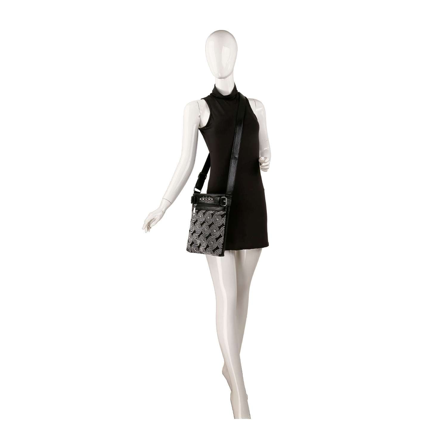 A mannequin in a sleeveless black mini dress showcases the Stunning Patterned Designed Crossbody Sling, featuring a stylish front panel and a wide, adjustable strap for versatile wear.