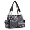The Leopard Print Fashion Handbag features a black and gray leopard pattern, silver studs, metal rings, rhinestone accents, decorative side pockets, and two studded handles.