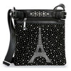 The Rhinestone Eiffel Tower Design Crossbody Sling features a black base, silver zipper and buckle details, and a crystal rhinestone Eiffel tower with scattered rhinestone dots across the front.