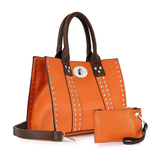 The Accessorized Twist-Lock Handbag is an orange faux leather tote with brown handles and silver studs, plus a matching orange zippered pouch with a black wrist strap.